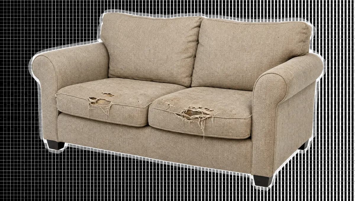 A worn sofa ready for collection